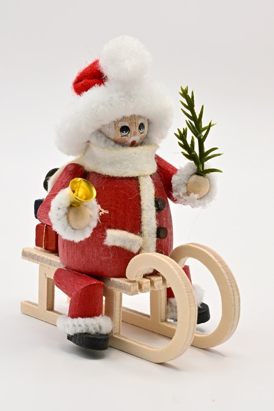 Figur, Weihnachtsmann auf Schlitten, rot
