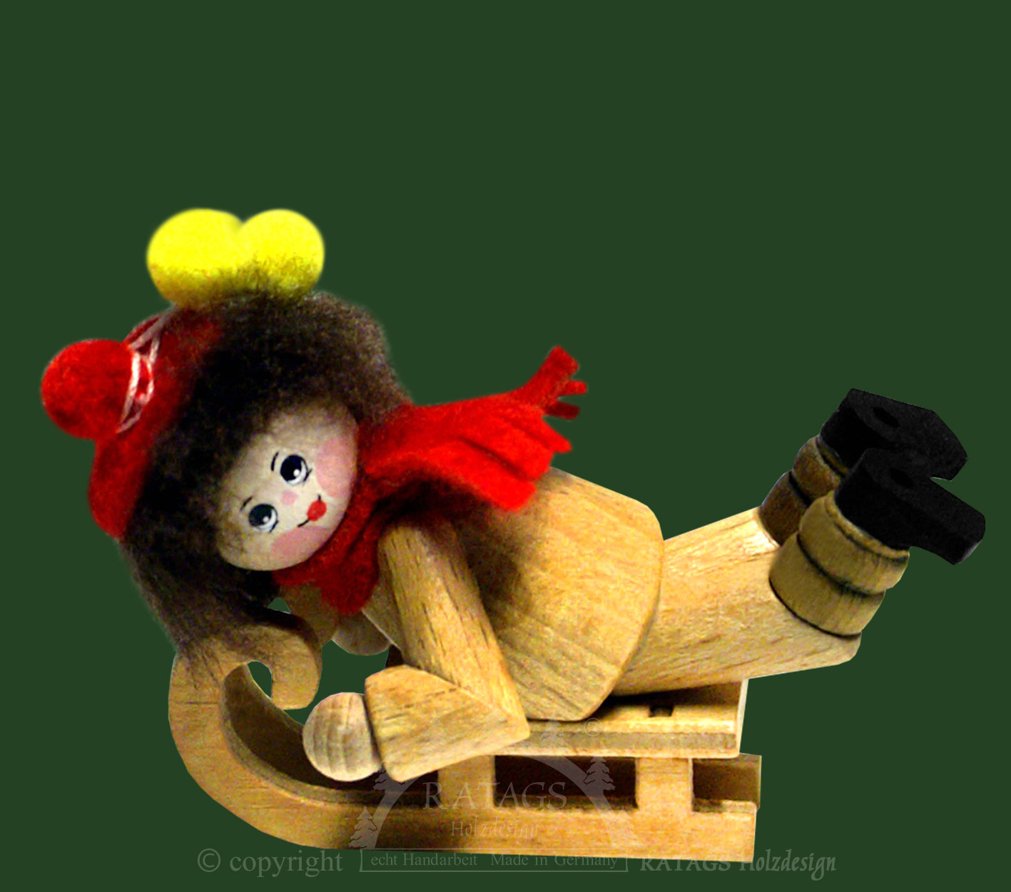 Collector's dolls, girls on sledges