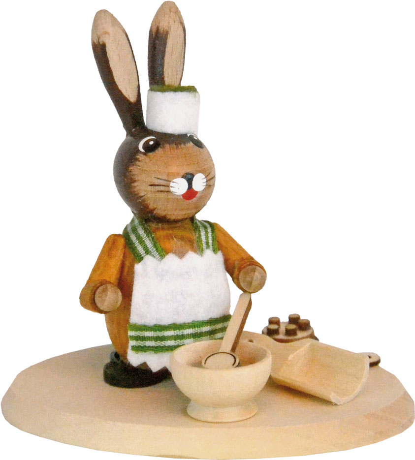 Osterbäcker, mit Schüssel und Rührlöffel