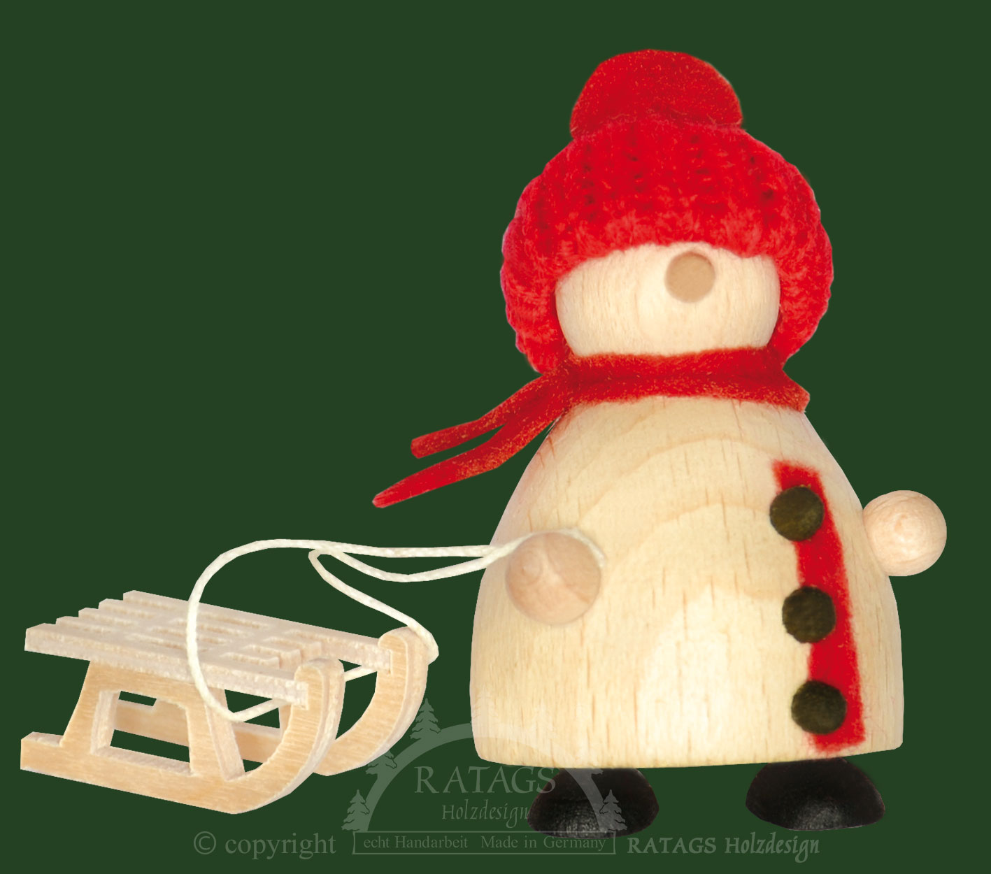 Snow-Molli, Junge Linie, mit Schlitten, rote Strickmütze