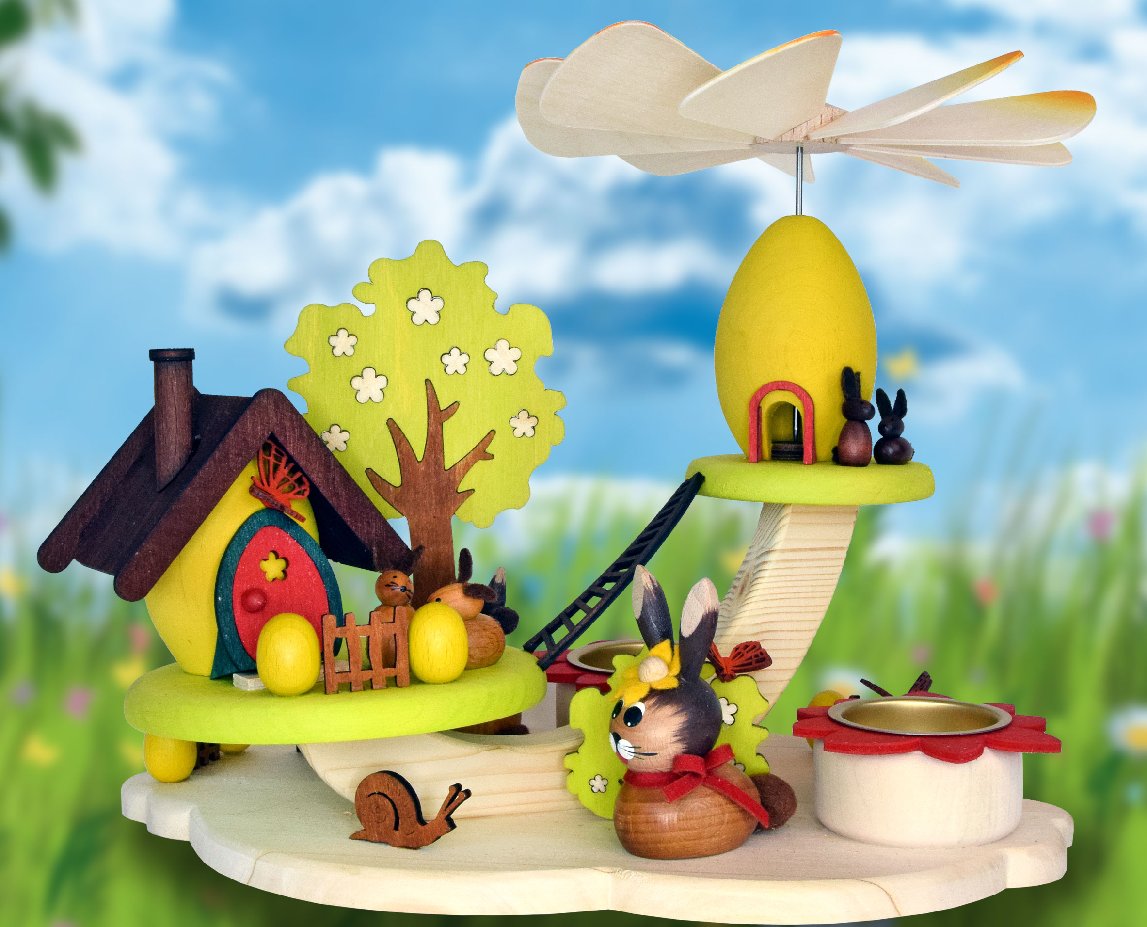 Easter egg pyramid with little houses and bunnies