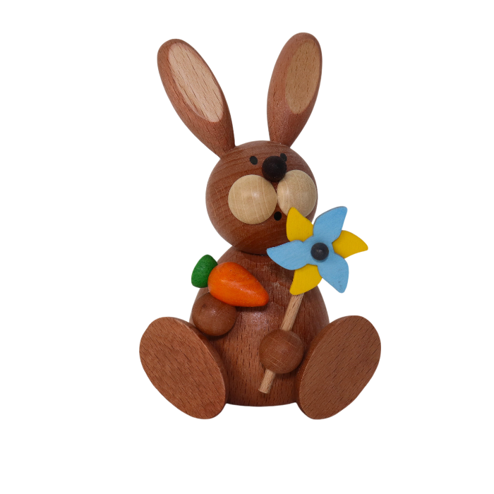 Osterhase sitzend mit Windrad 11 cm