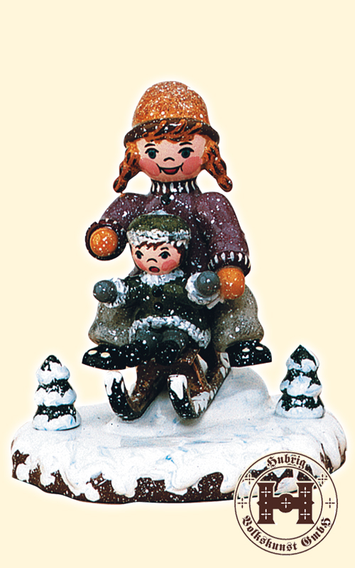 Winterkind, Schlittenfahrerin