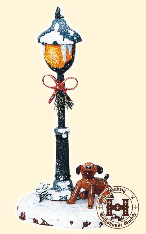 Bello under a lantern in winter