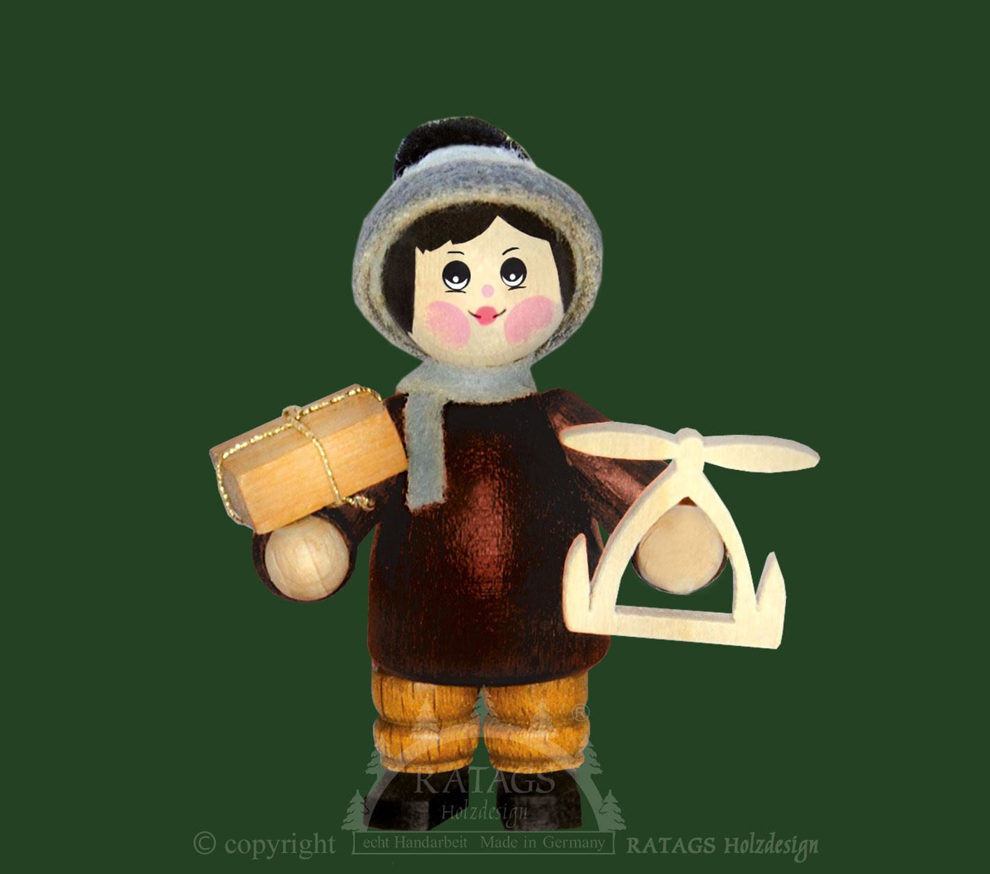 Figur, Junge mit Pyramide und Geschenk