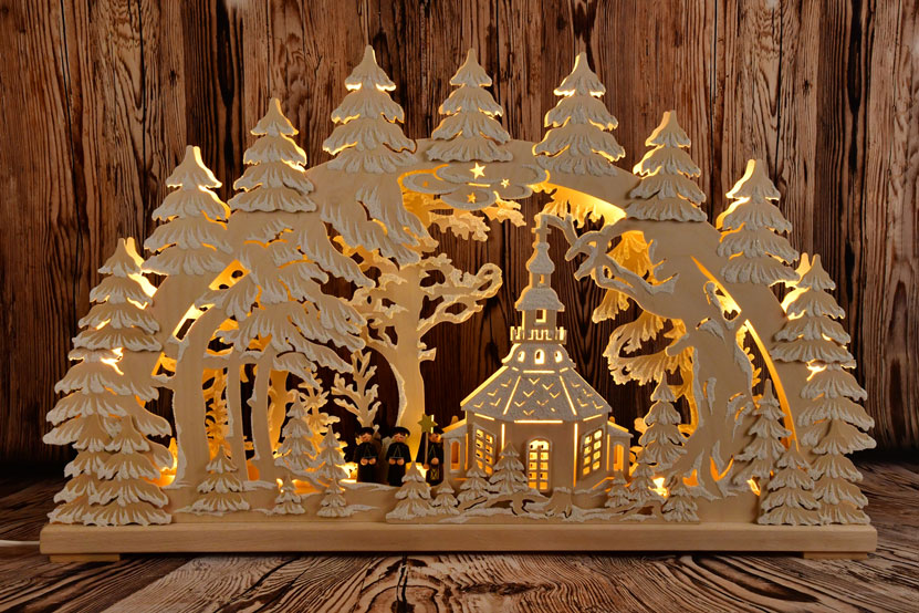 Large candle arch, carol singers, hoarfrost