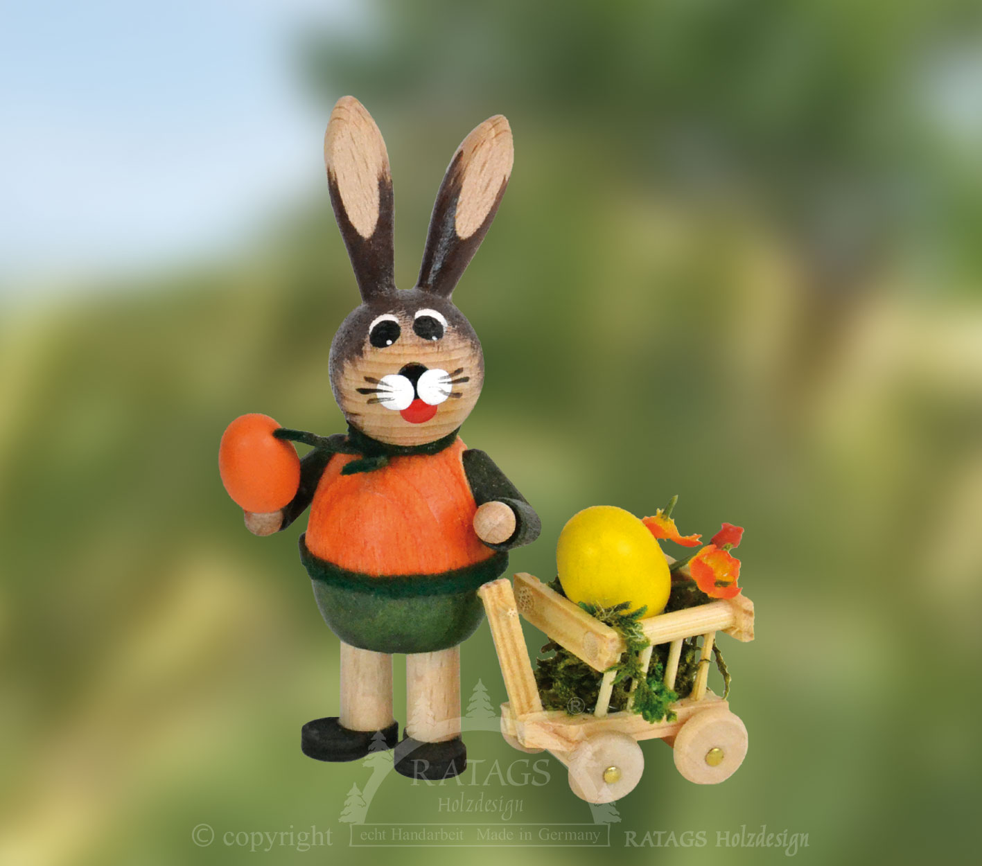 Velikonoční zajíc, zelený/oranžový, s ručním vozíkem