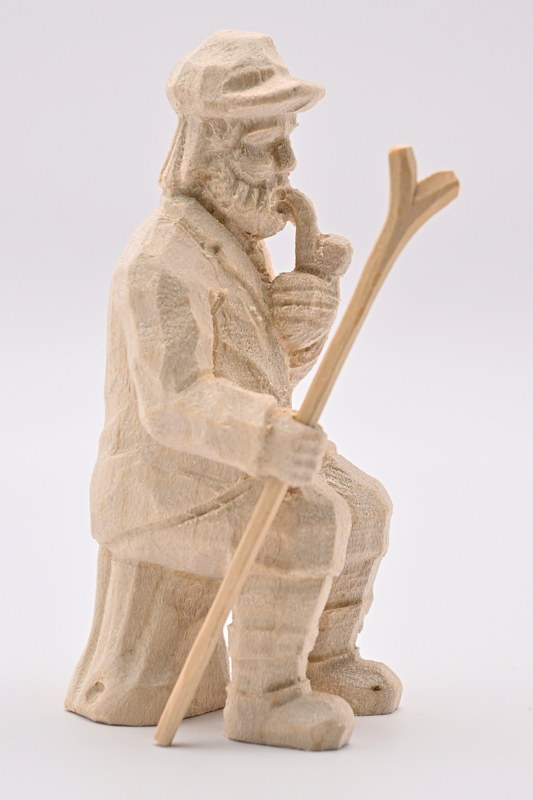 Forester, sitting on a tree trunk, pipe, 80 mm