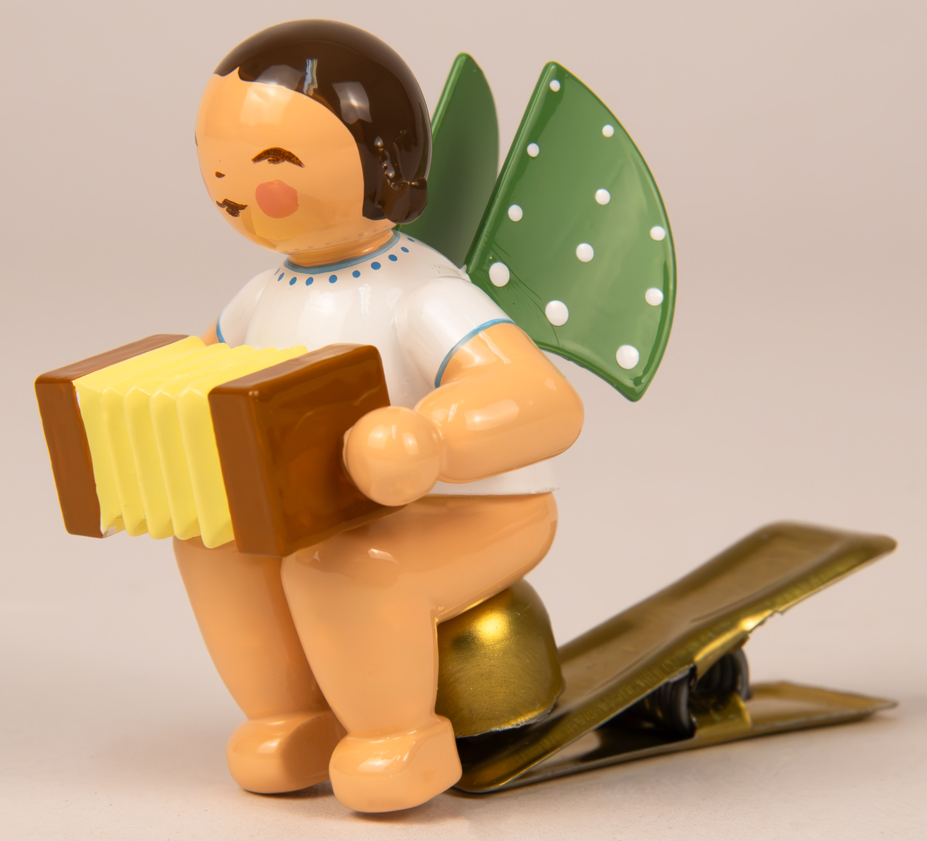 Engel mit Harmonika, auf Klemme, dunkelb