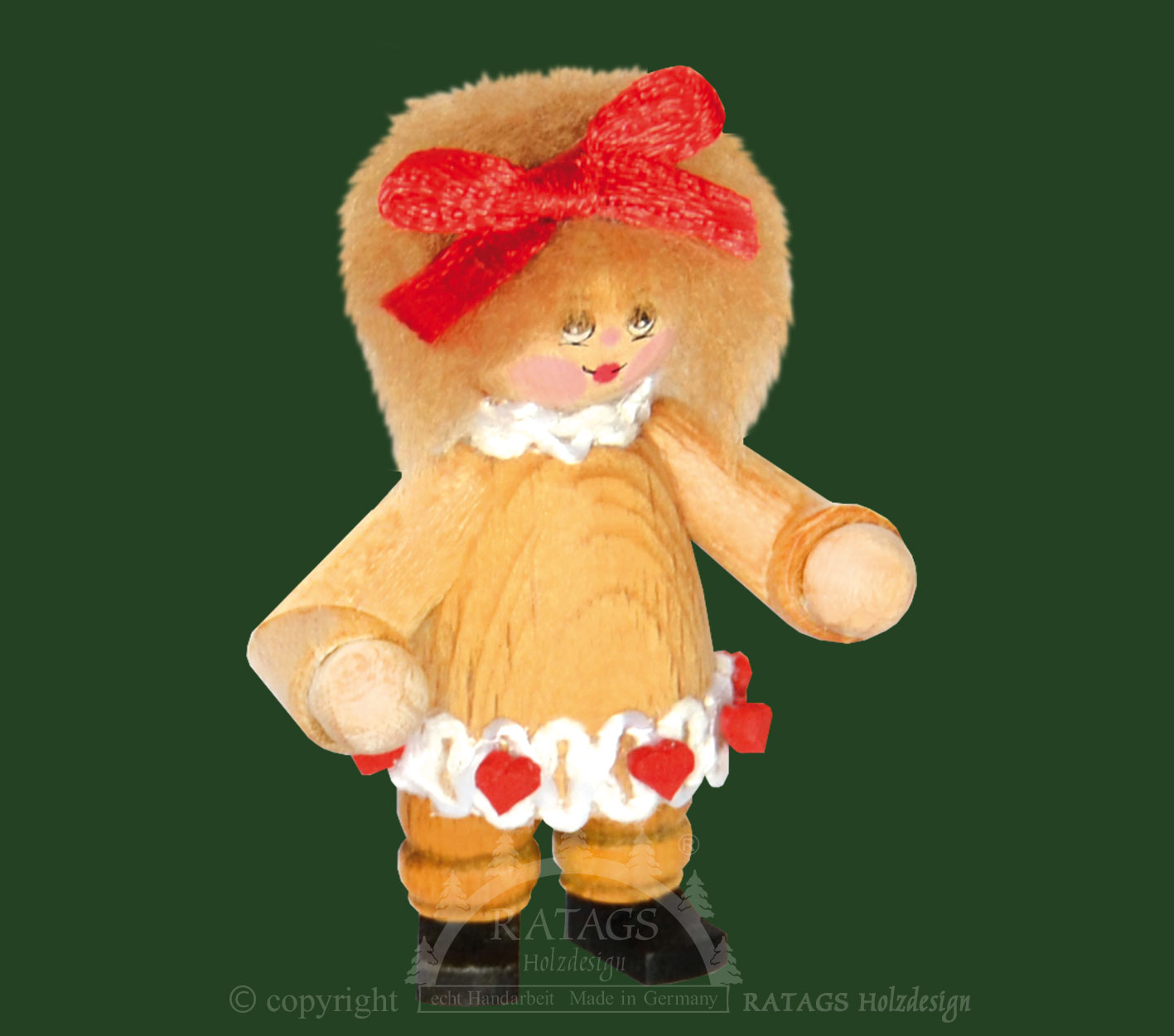 Collector's doll figure, girl with red bow