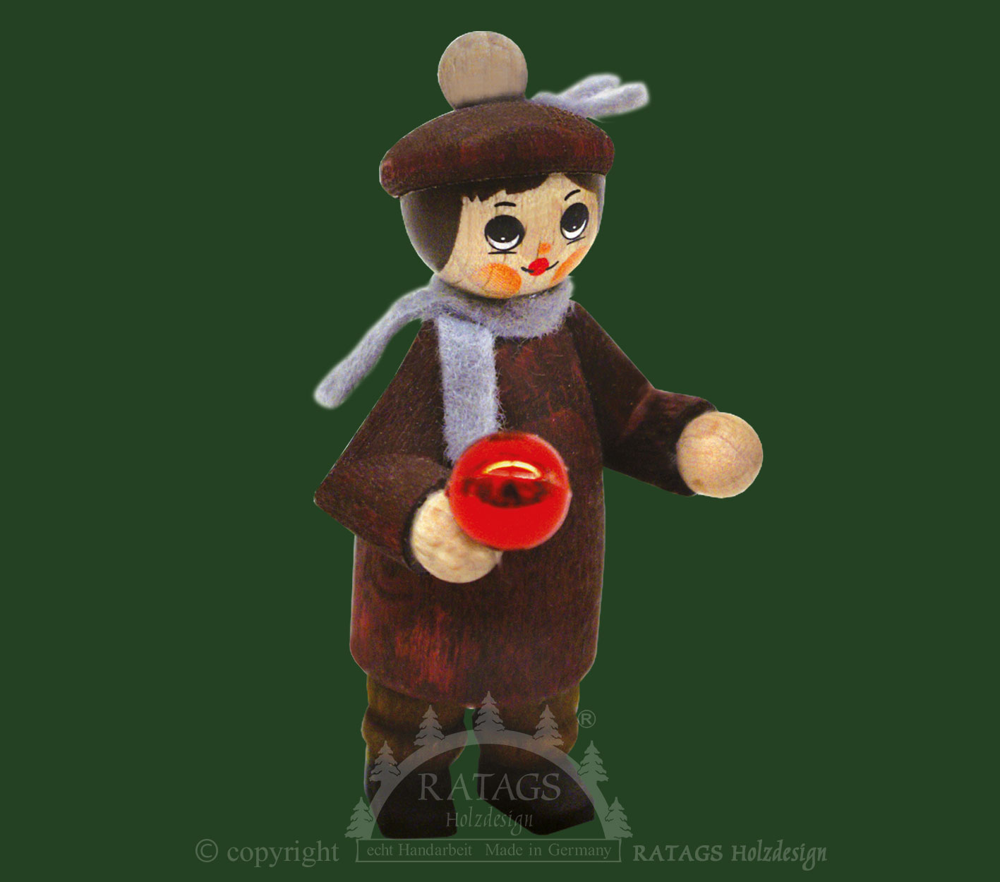 Figuur, kind met rode kerstbal