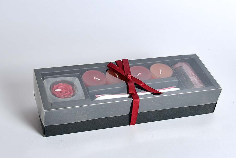 A set of candles, red, yellow