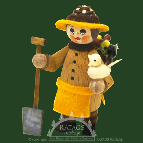 Figure, gardener with spade and bird, natural