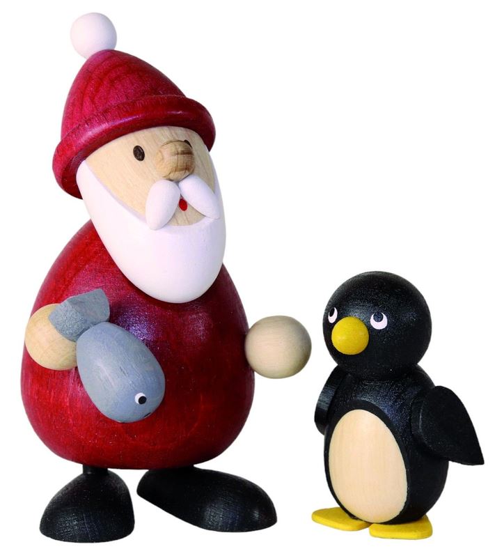 Weihnachtsmann mit Fisch und Pinguin
