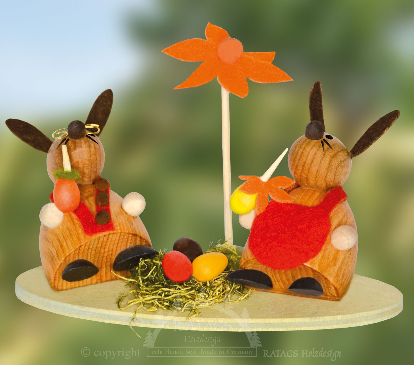 2 bunnies sunbathing, flower, nest