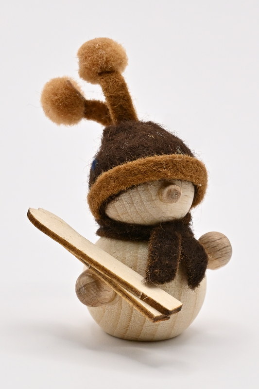Natural snowman with skis and two pom-poms, H 3.5 cm