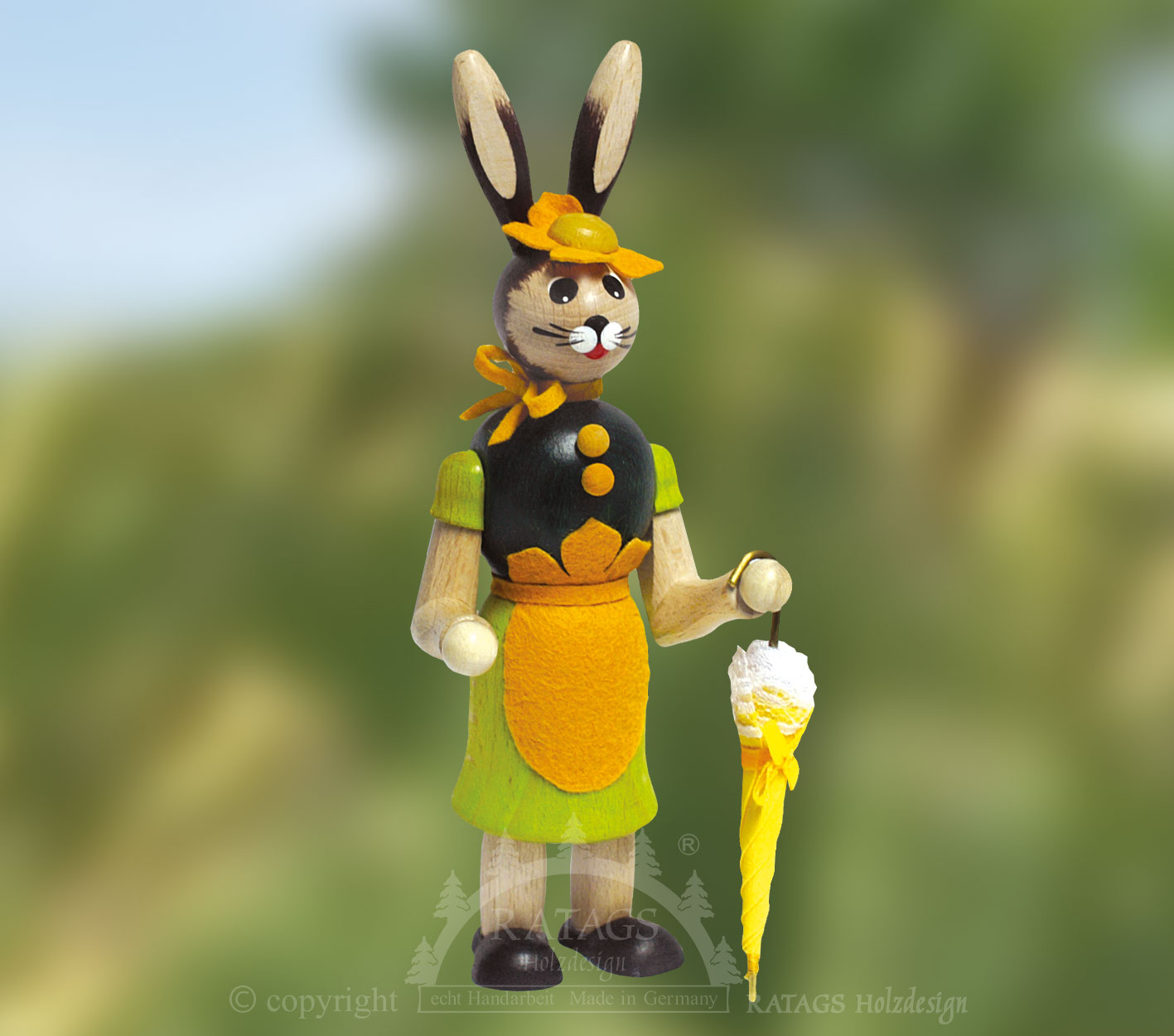 Osterhäsin, grün, mit gelbem Schirm Osterhäsin, grün, mit gelbem Schirm