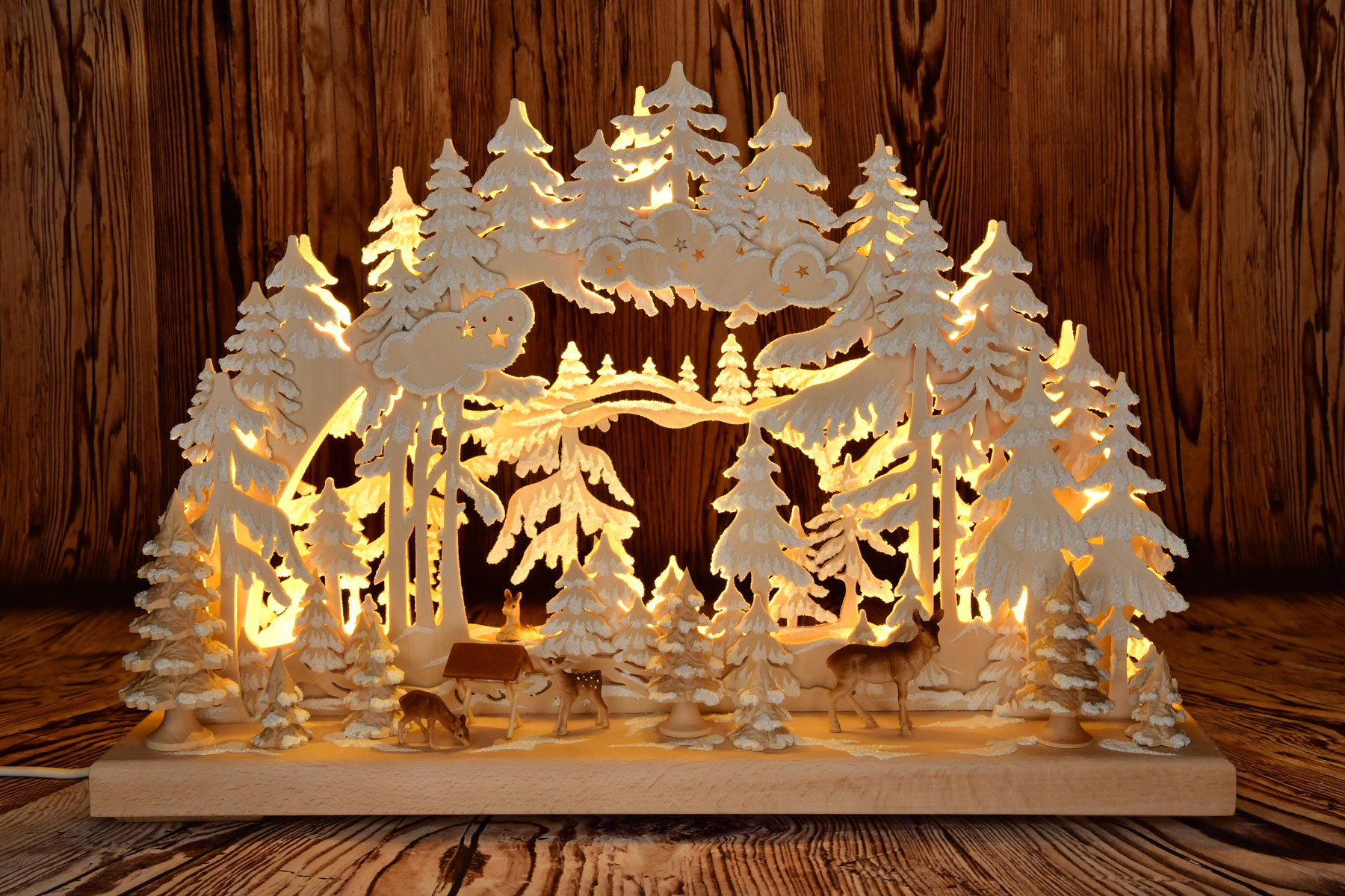 3D candle arch, small deer in the clearing, hoarfrost