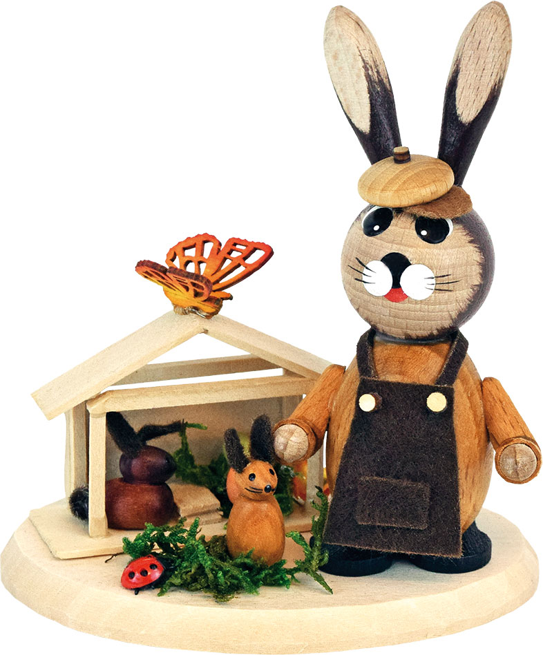 Rabbit meadow with bunnies and rabbit hutch