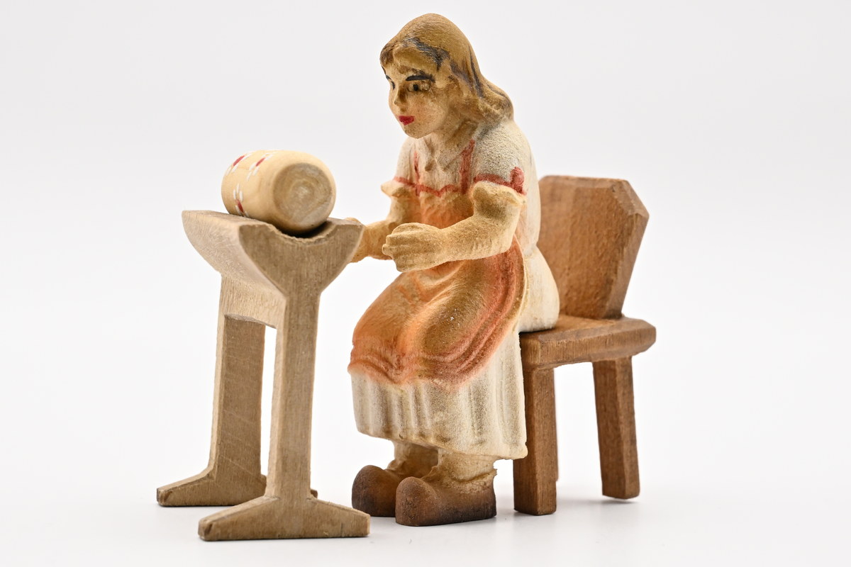 Bobbin lacemaker with bobbin bench, coloured, 35 x 65 mm