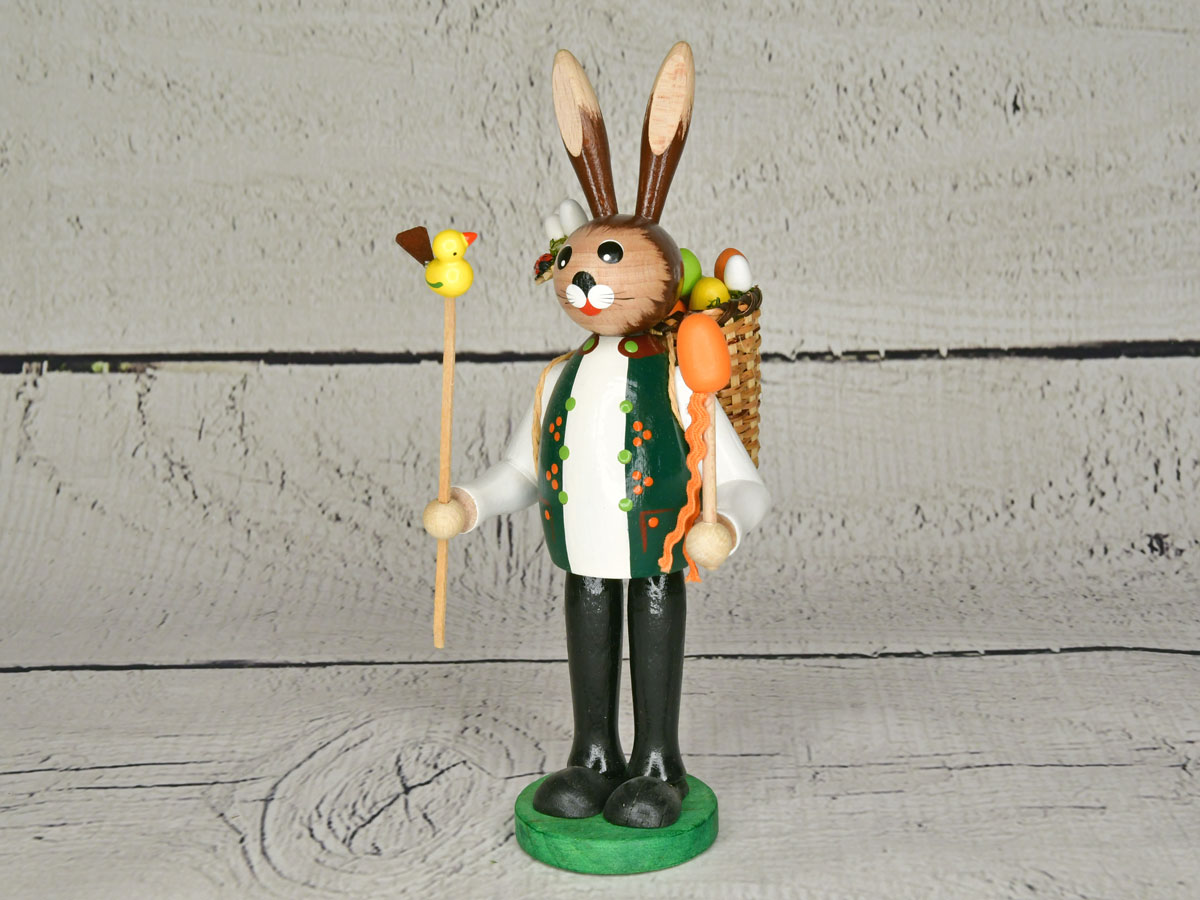 Easter bunny with rake and egg basket