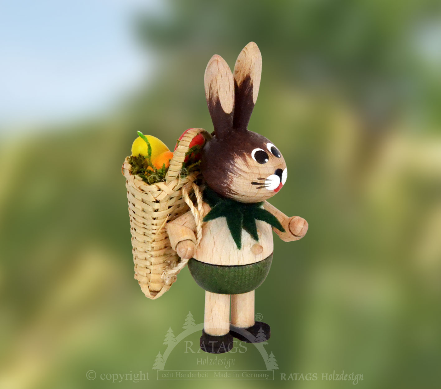 Osterhase, grün, mit Rückentragekorb