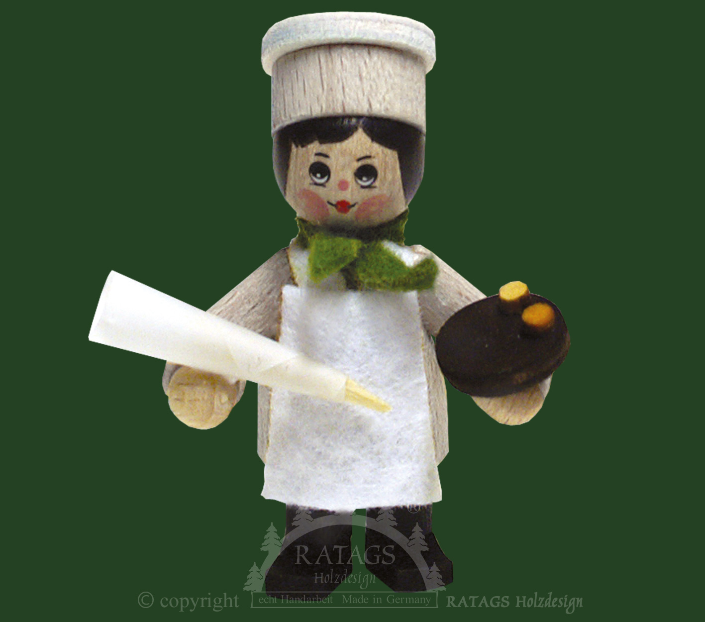 Figurka, cukrář s cukrářskou stříkačkou