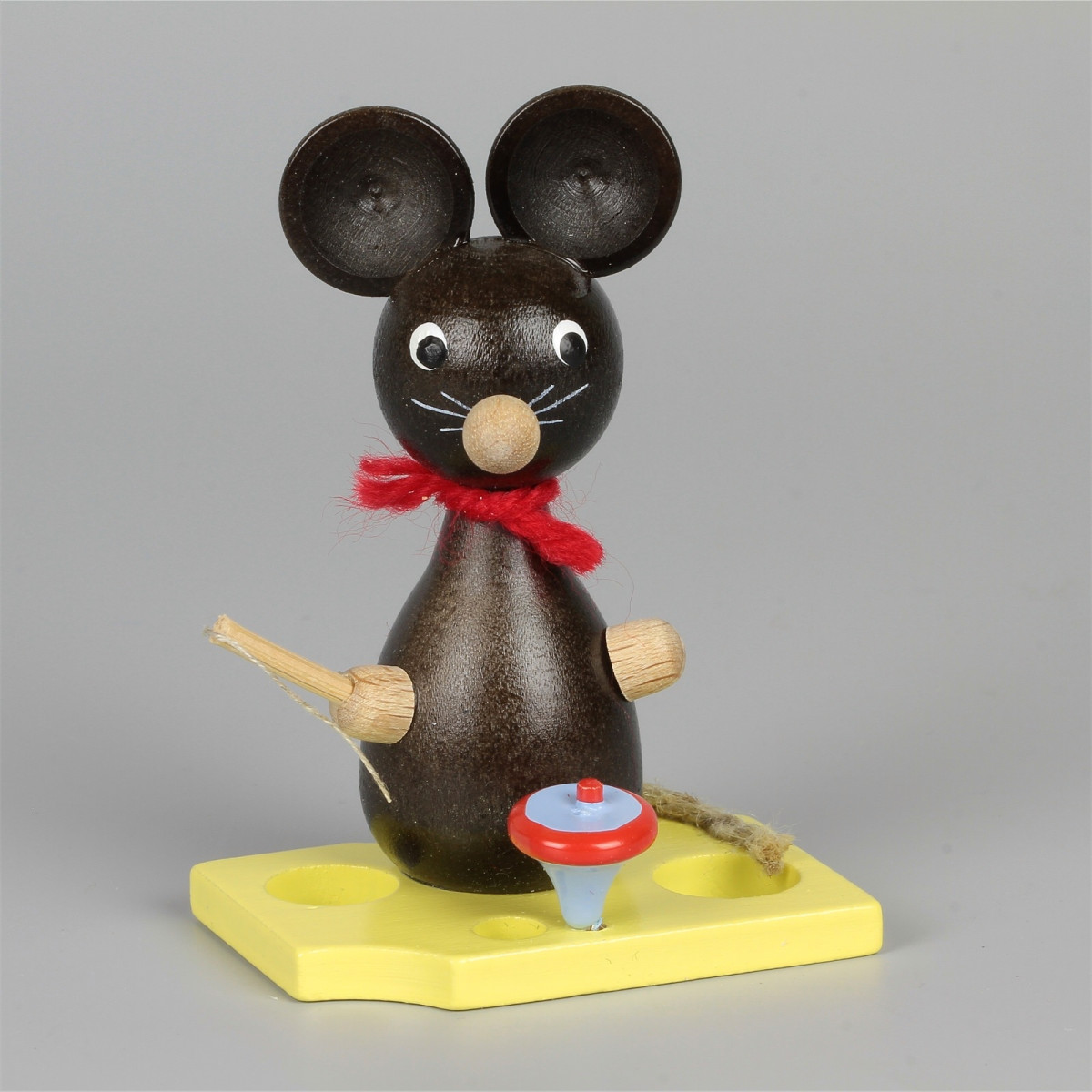 Mäusekind mit Kreisel