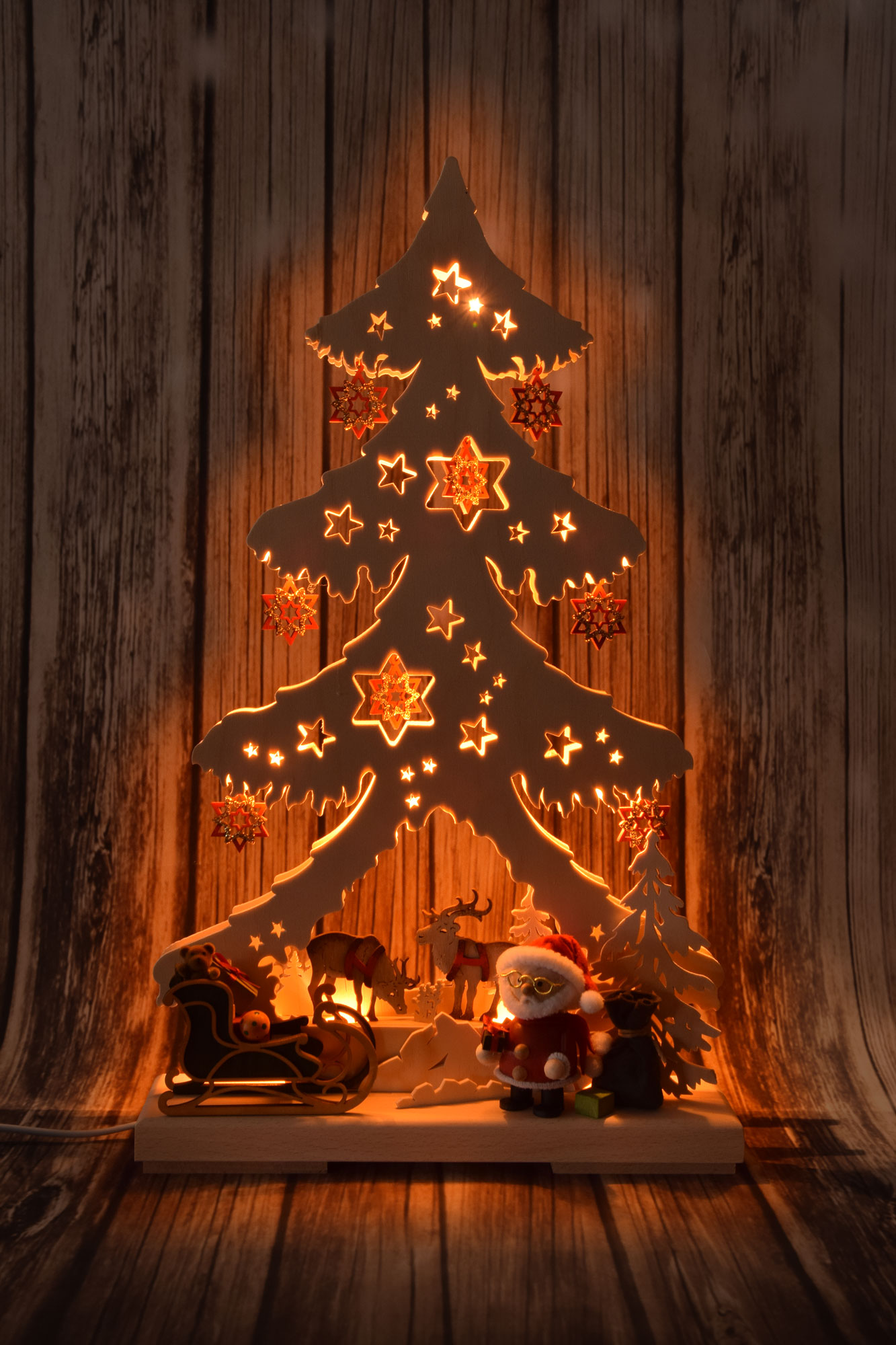 Medium-sized fir tree, Father Christmas with reindeer