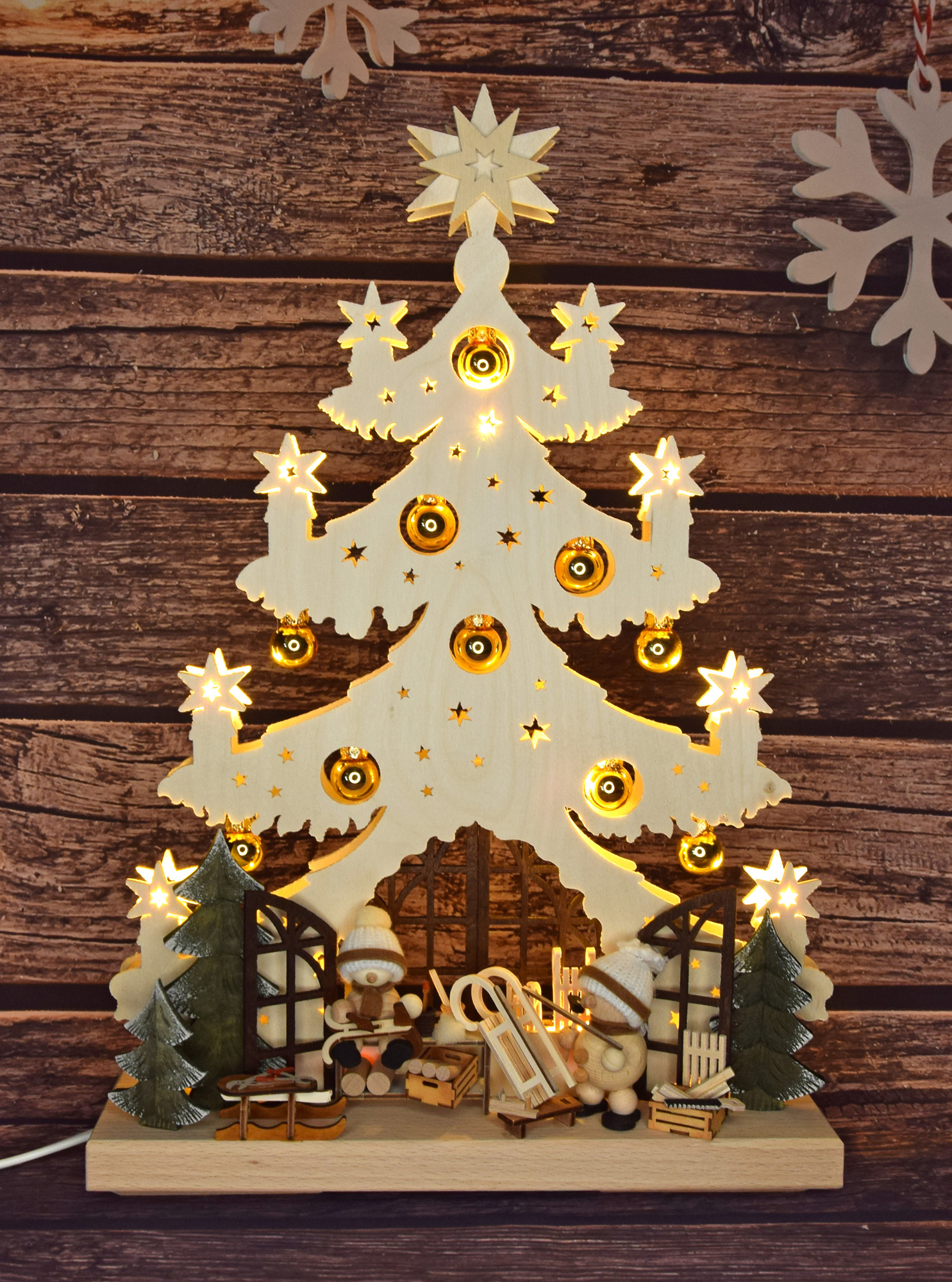 Small fir tree, snowmen in the fir tree room, golden baubles