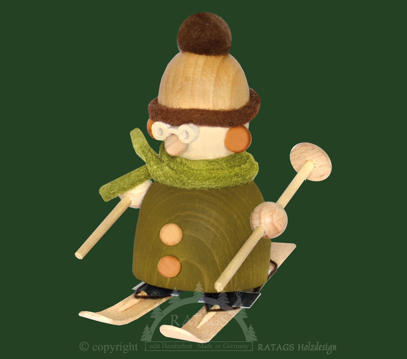 Molli on skis, with glasses, green/brown