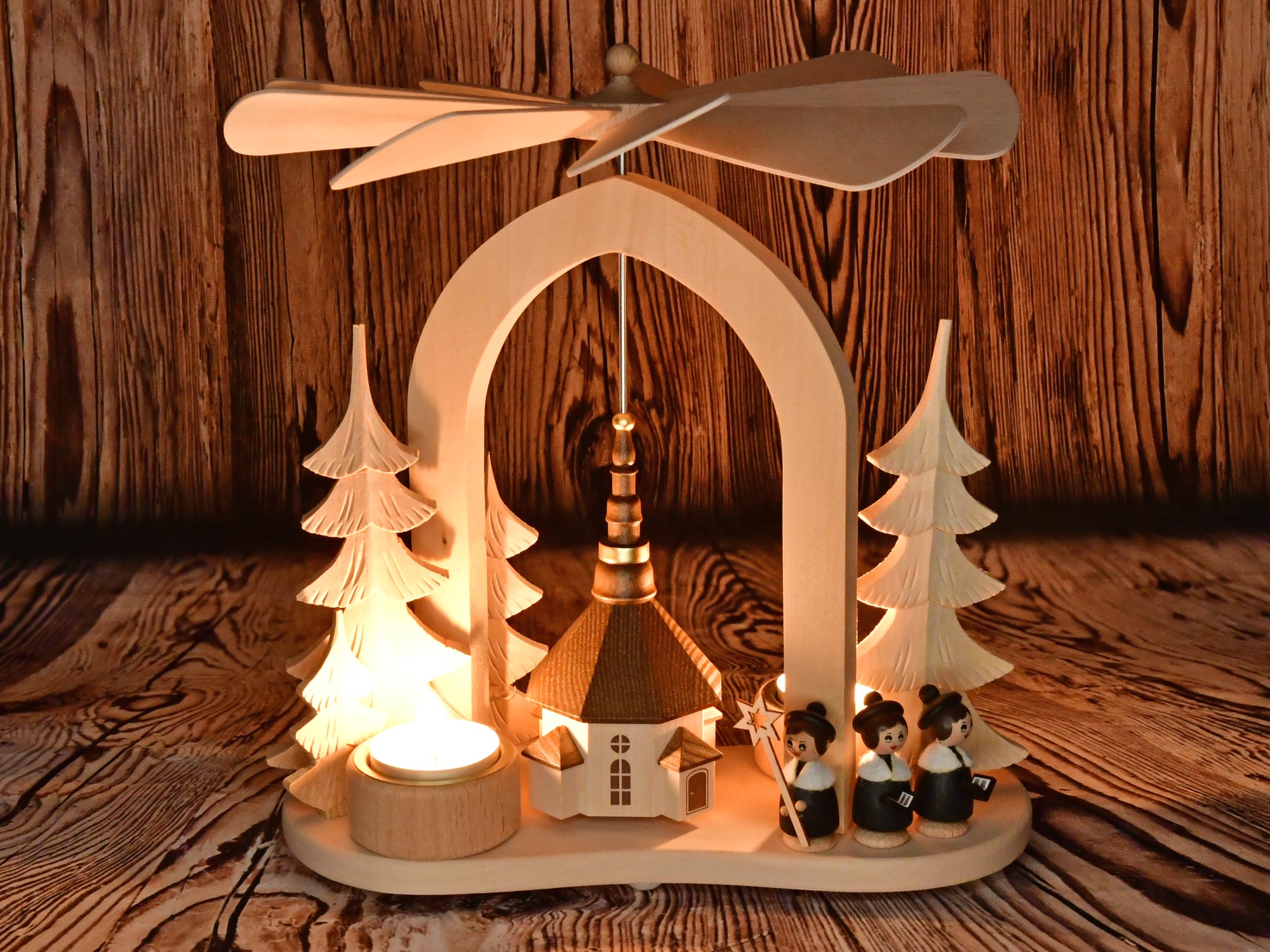 Star arch pyramid with church and carol singers Table pyramid, solid wood