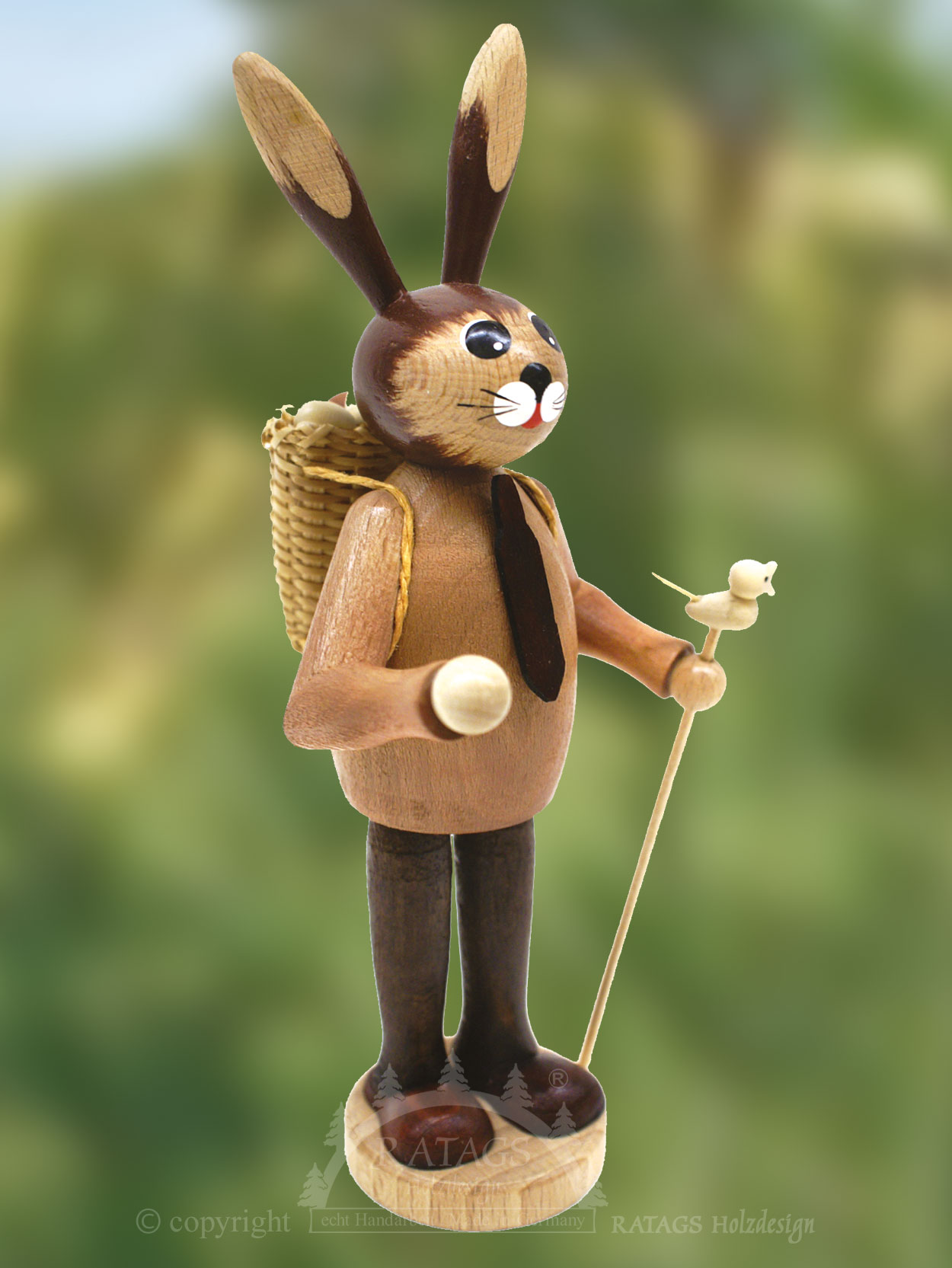 Rabbit man with basket, stick, bird