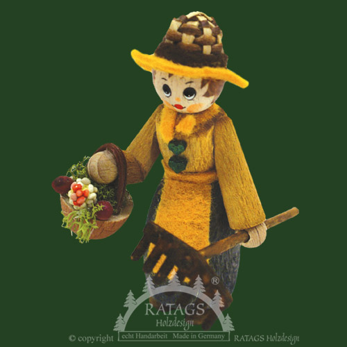 Figure, gardener with vegetable basket