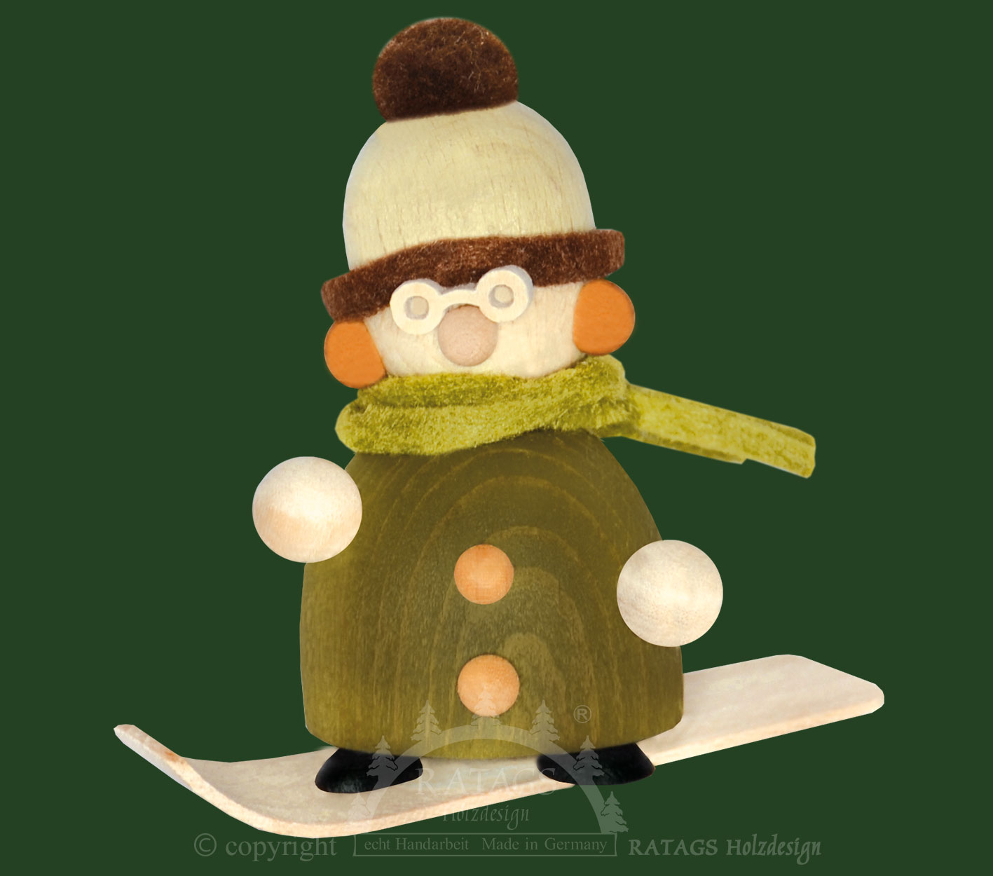 Molli on a snowboard, with glasses, green/br