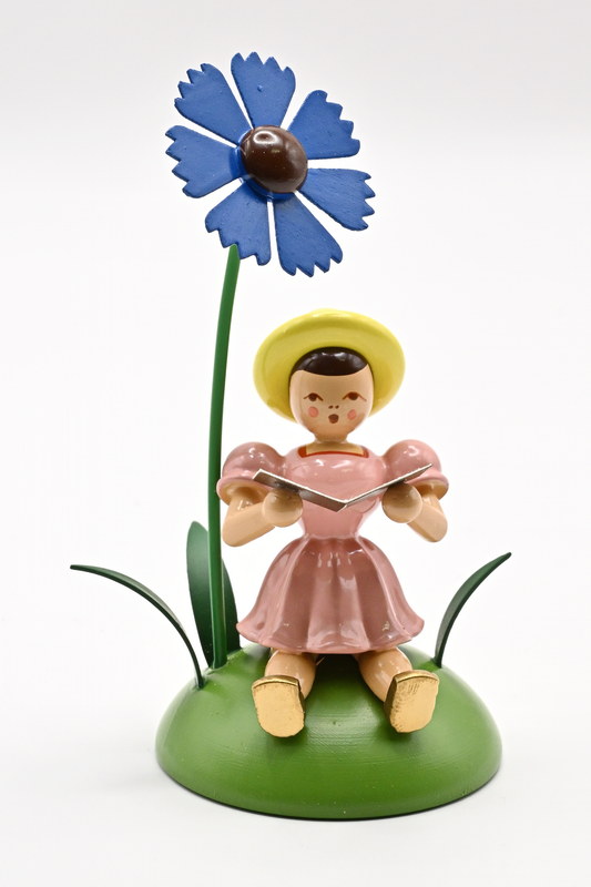 Cornflower, singer Flower child sitting