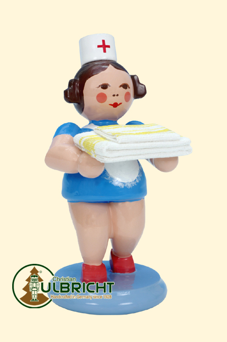 Nurse with bed linen