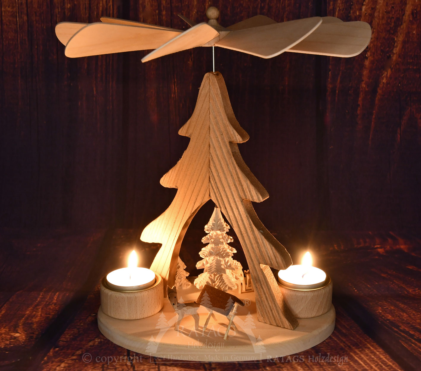 Solid wood pyramid, oval, 3 deer with manger and tree