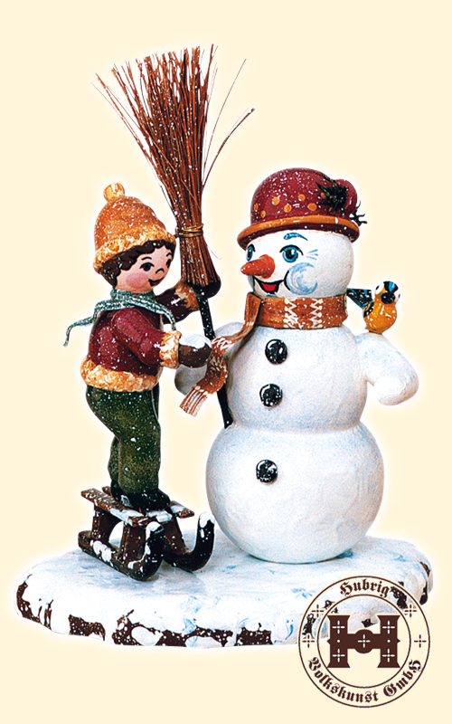 Winterkind, jongen sneeuwpop