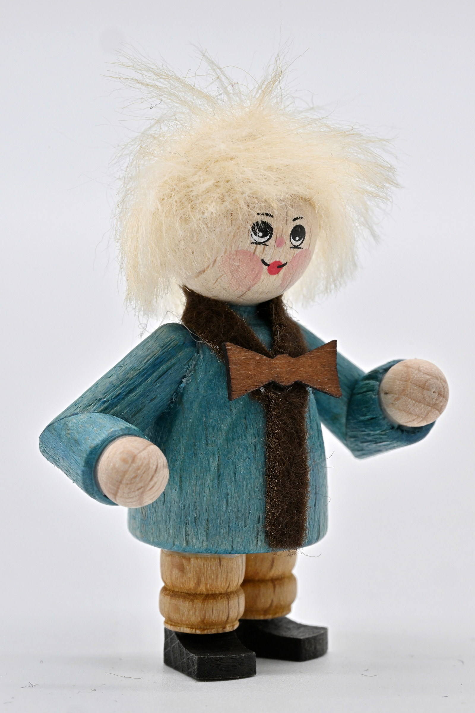 Figur, Kind mit Ohrenschützern H 5 cm Figur, Kind mit Ohrenschützern H 5 cm