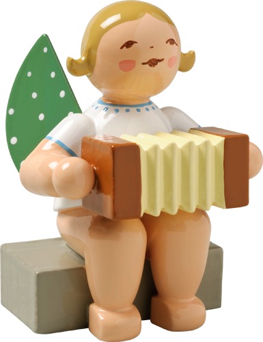 Engel mit Harmonika, sitzend blondes Haar