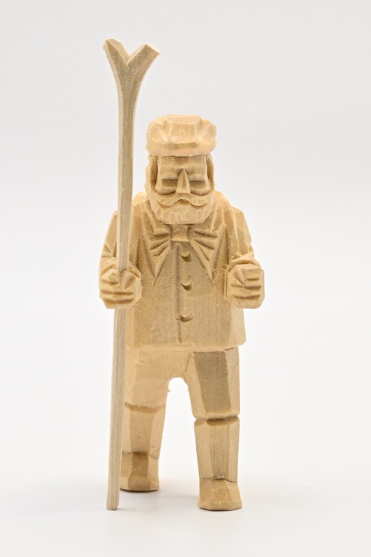 Hiker, rucksack, stick, roughly 60 mm