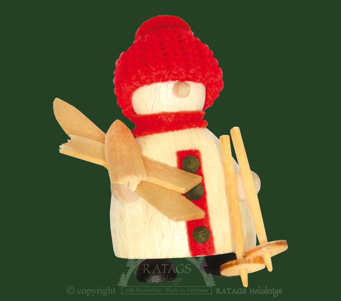 Snow-Molli, boys' line, with skis on a red knitted hat