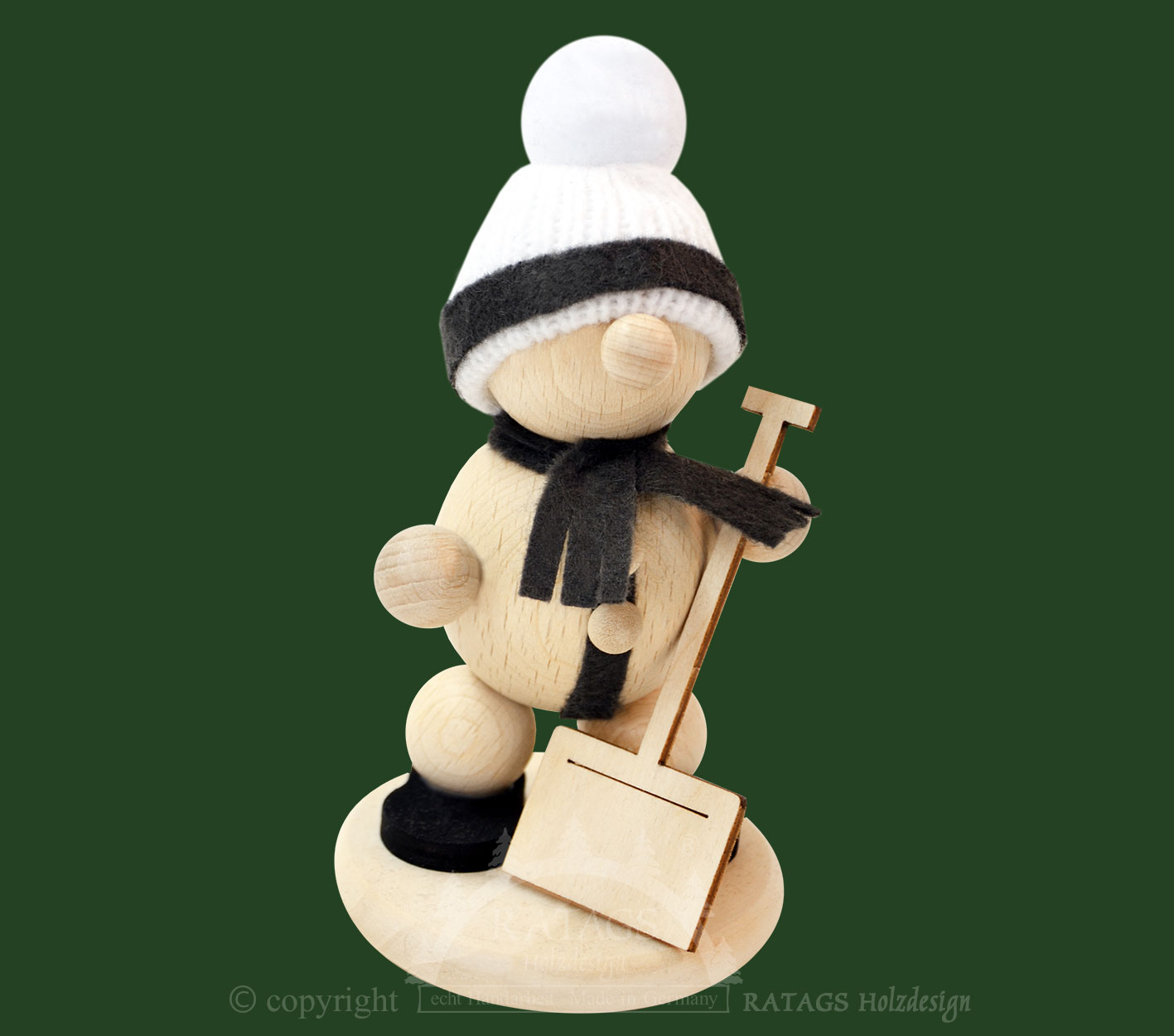 Snowman with snow shovel